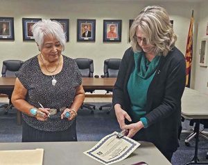 Rosie Sekayumptewa (left) was sworn on Dec. 12 by Navajo County School Superintendent Jalyn Gerlich (right) to represent District 2 on the college’s governing board.