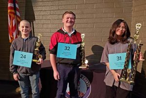 The winners of the Navajo County Spelling Bee include (left to right) Levi Talerico, third place; Spencer Whiting, second place; and Shaunce’ Yellowhair, first place.