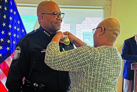Winslow’s new Chief of Police Franklin Caldwell had his badge pinned on him by his wife Celeste Caldwell.