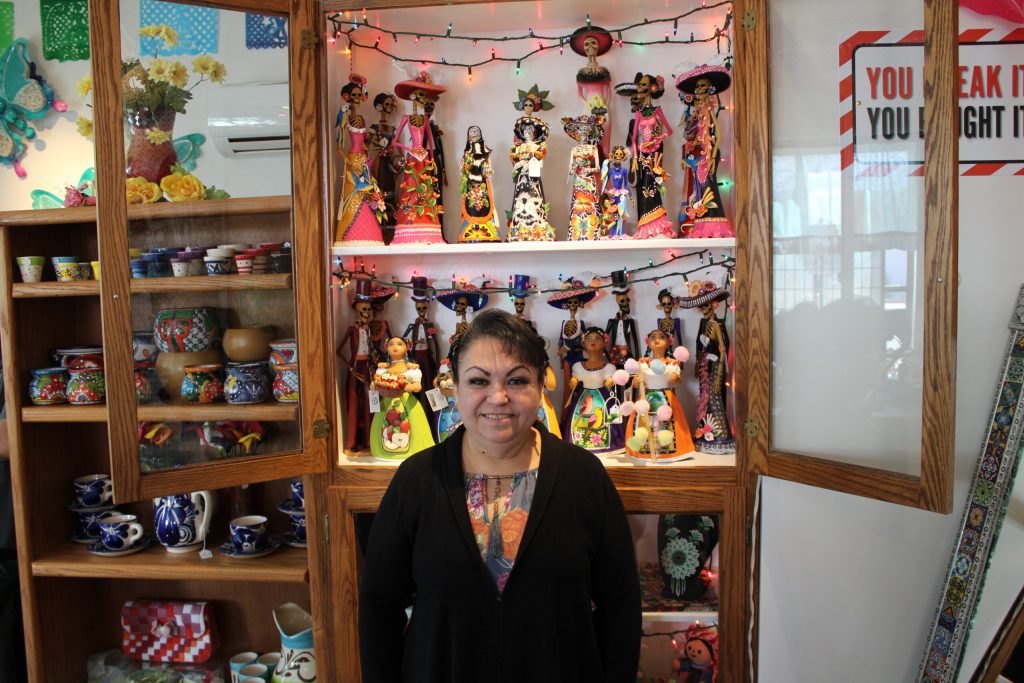 Nohemi Palacios stands amidst the vibrant array of Mexican art in her newly opened store, Las Mariposas, in downtown Winslow. Each piece, sourced from artisans across Mexico, tells a story of heritage and craftsmanship, bringing a burst of color and culture to the heart of the community.
