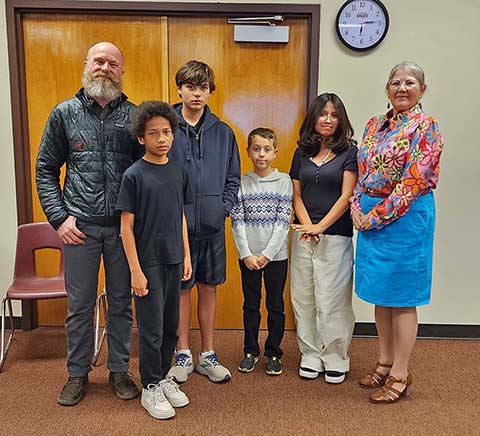 Photo provided by WUSD / Winslow Unified School District students were recognized by the governing board for taking part in the Navajo County Spelling Bee. Pictured are (left to right) sponsor Chris Atwood, spelling bee participants sixth grader Elijah Reyes, seventh grader Gabriel Gerber, third grader Tucker Baker and eighth grader Shaunce’ Yellowhair who became the county spelling bee champion, and Superintendent Connie Gover.
