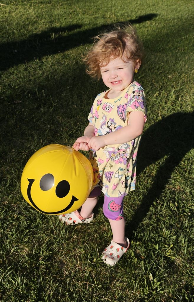 Robyn Meeks, daughter of Josh and Riley Meeks, putting on her happiest face in honor of Happy Holbrook Month. The community celebrated with the Happy Holbrook Hullabaloo.