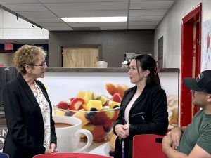 Holbrook citizen Cayla Serna (right) conversed with candidate Sharon Jakubowski Wolz (left) during the meet and greet.