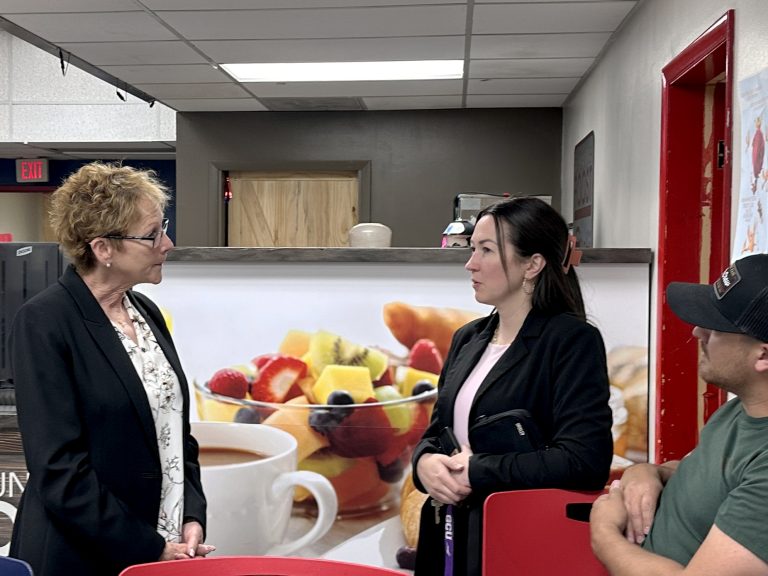 Holbrook citizen Cayla Serna (right) conversed with candidate Sharon Jakubowski Wolz (left) during the meet and greet.