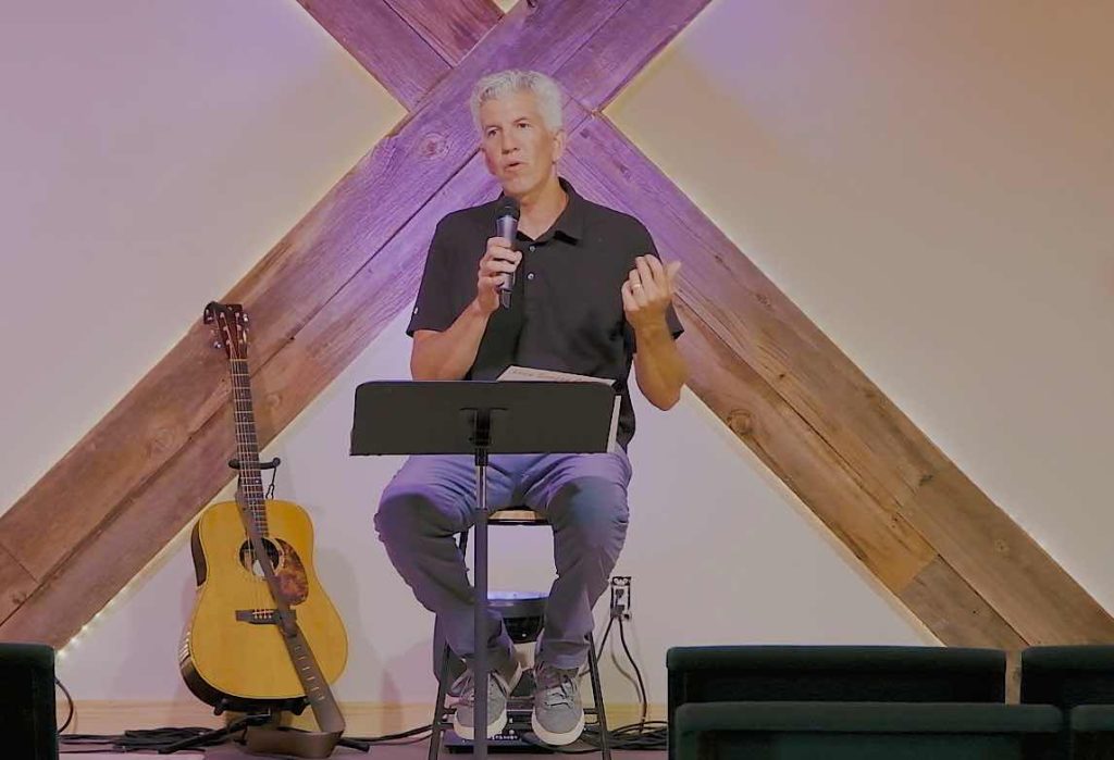 Randy Therio, addresses those attending the chapel at Multiply Church.