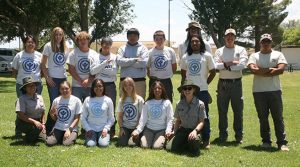 Those working in Youth Conservation Corps (YCC) include (front row, left to right) Park Guide Victoria Philpott, Ria Barela, Alisa Johnson, Susannah Roberts, Elena Philpott, Park Ranger Desiree Dye, (back row) Denessa Begay, Elenor Hansen, Riley Quinn, Emery Yazzie, Kardell Morris, Ezekial Knight, Skyler Joe, Ephriam Benally, AZCC Mentor Nataani Jacques and AZCC Mentor Nathan Pimienta.