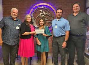 Little Colorado Medical Center (LCMC) has generously donated $1,940, to the Winslow High School Athletic Fund, a contribution that directly supports student-athletes and enhances their overall experience. Pictured are (left to right) LCMC Chief Ancillary Officer Doug Umlah, WUSD Superintendent Connie Gover, LCMC Outpatient Services Director Ashley Wilkie, LCMC CEO Travis Udall and WHS Athletic Director Ricky Greer.