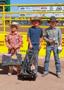 For the Little Buckaroo Steer Riding competition, Brooks Reidhead (right) won first place, Leozandro Benton (center) won second place and Trevor Smith (left) won third place.
