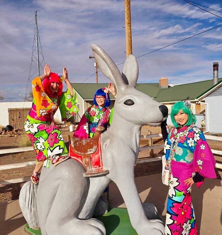 A Japanese musical group enjoyed a trip down Route 66 including an iconic by pose with the jack rabbit at Jack Rabbit Trading Post near Joseph City. Pictured are (left to right) Susie, Komako and Martha of Bentenya.