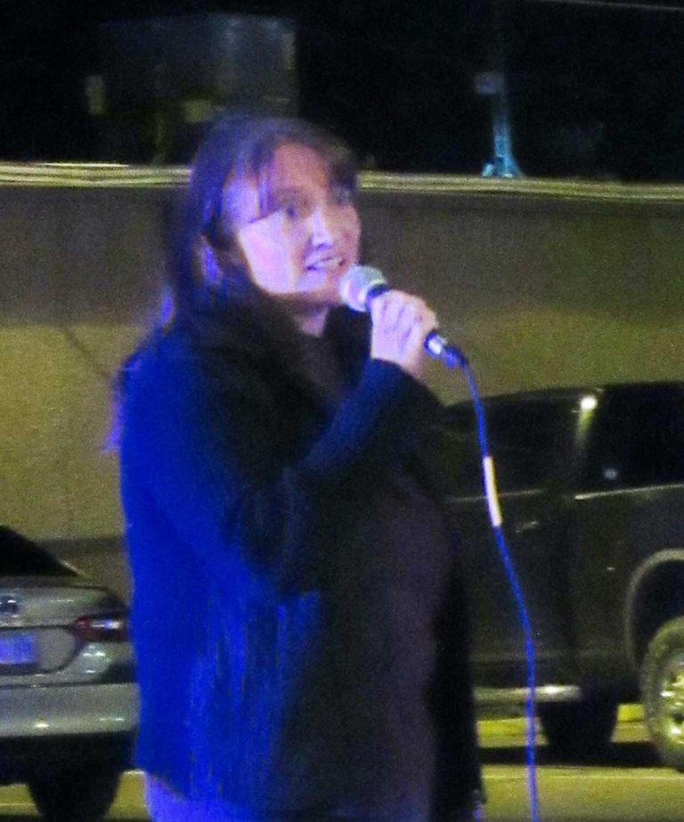 Holbrook Mayor Kathleen Smith speaks of the importance of domestic violence awareness.