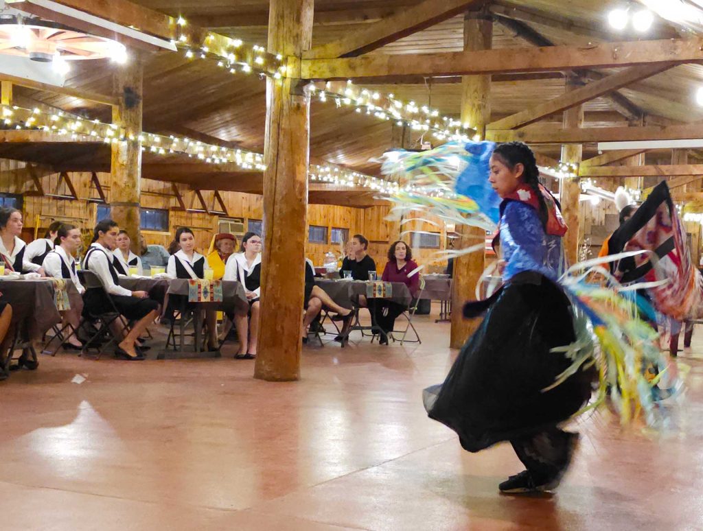 Arianna Brown performed a Native American shawl dance for French visitors at the Navajo County Fairgrounds in Holbrook.