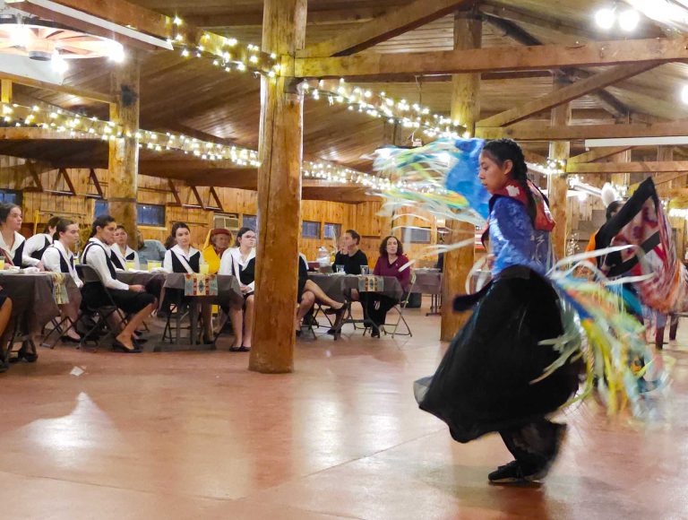Arianna Brown performed a Native American shawl dance for French visitors at the Navajo County Fairgrounds in Holbrook.