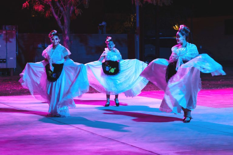 Aguilas de Oro put on a beautiful performance at the Dia De Los Muertos (Day of the Dead) event held in Winslow last week. Día de los Muertos is a Mexican holiday where families welcome back the souls of their deceased relatives for a brief reunion that includes food, drink and celebration. This event was hosted by Winslow Arts Council.