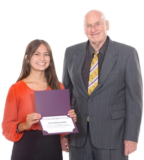 Felicity Pizell (left) was presented with a scholarship by Dr. Robbin MacDonald (right).