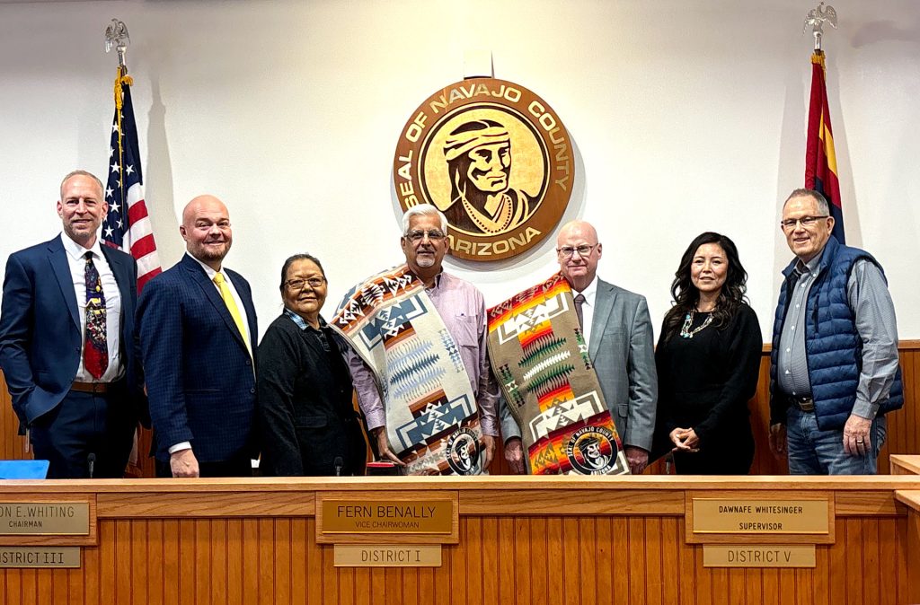 The Navajo County Board of Supervisors honored outgoing officials Mike Sample and Dale Nielson for their years of service. Pictured are (left to right) County Manager Bryan Layton, Chair Jason Whiting, Vice Chair Fern Benally, Mike Sample, Dale Nielson, Supervisor Dawnafe Whitesinger and Supervisor Daryl Seymore. Supervisor Alberto Peshlakai attended the meeting virtually.