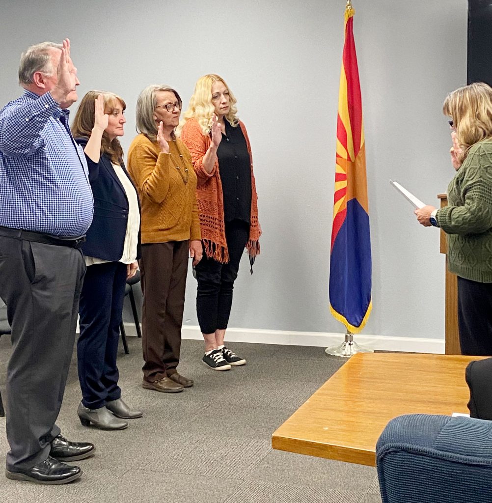Holbrook city elected officials were sworn into office last week by City Clerk Lisa Hunt (right). They include (left to right) Councilman Mike Nilsson, Mayor Kathleen Smith, Councilwoman Teri Tafoya and Councilwoman Church.