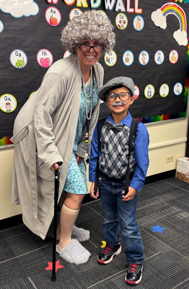 Hulet Elementary School Principal Nichole Tow and kindergartener Ryden Sulu dressed the part in celebration of the 100th day of school.