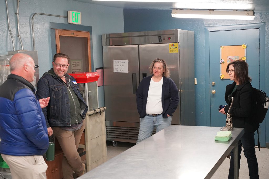 Pictured (left to right) are Russ Yelton from White Mountain Economic Development (WMED), Gabe Gardner from Local First Arizona, Laurie Lashomb the market manager and Kimber Lanning also from Local First Arizona who took a tour of the commercial kitchen located at the Winslow Council on Aging’s community center on Second Street. Local First Arizona has opened four similar kitchens with a fifth one in Glendale on the way. WMED are behind a similar rentable commercial kitchen in Show Low that will launch soon.