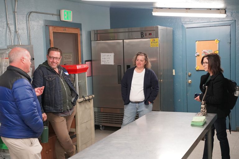 Pictured (left to right) are Russ Yelton from White Mountain Economic Development (WMED), Gabe Gardner from Local First Arizona, Laurie Lashomb the market manager and Kimber Lanning also from Local First Arizona who took a tour of the commercial kitchen located at the Winslow Council on Aging’s community center on Second Street. Local First Arizona has opened four similar kitchens with a fifth one in Glendale on the way. WMED are behind a similar rentable commercial kitchen in Show Low that will launch soon.