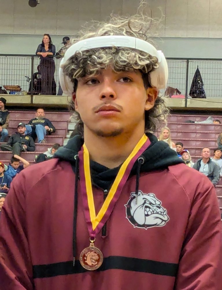 In the 144-pound class, Michael Romero of Winslow placed third.