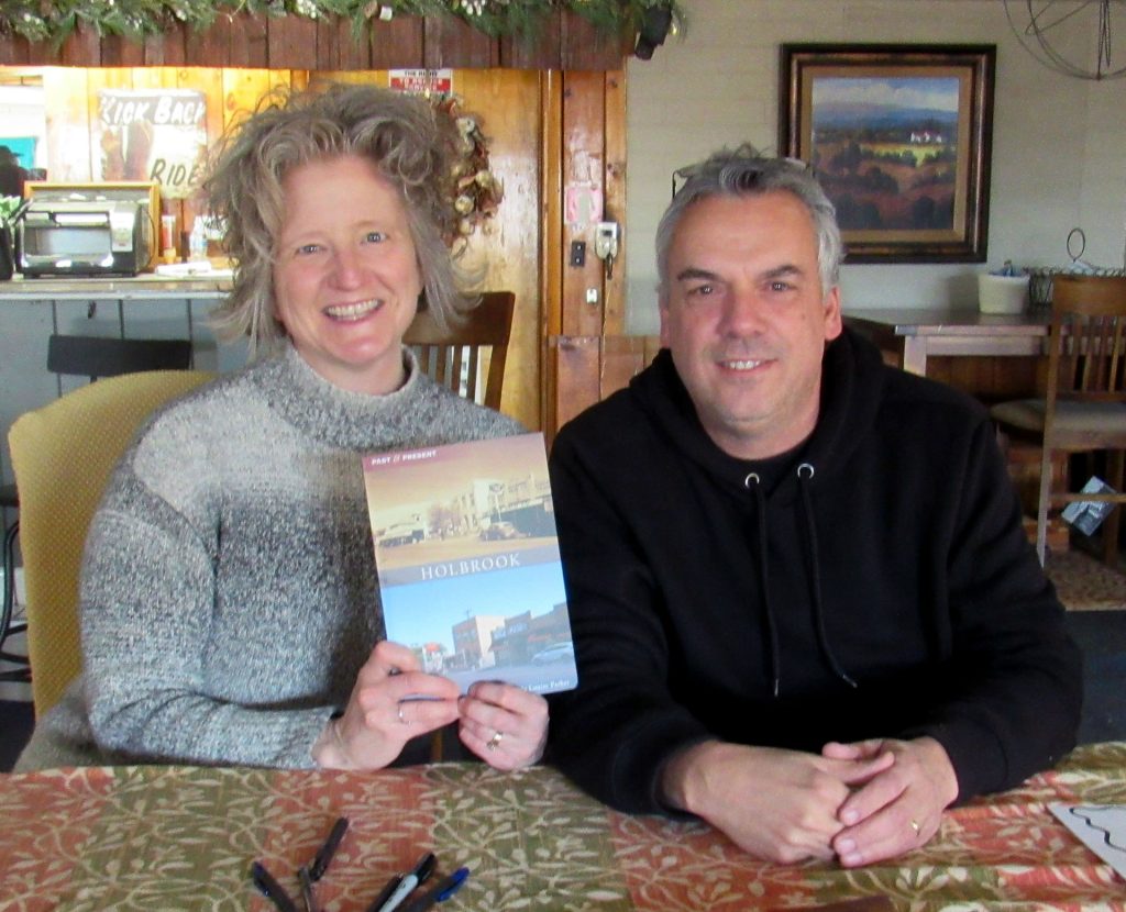 Linda and Bill Parker pose with their newly published book, Holbrook Past and Present.