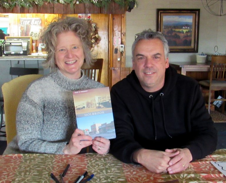 Linda and Bill Parker pose with their newly published book, Holbrook Past and Present.