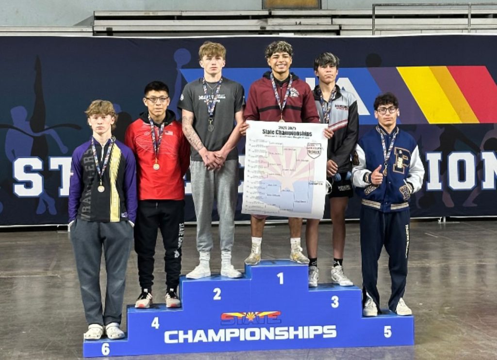 Bulldog Michael Romero (top of podium) takes the gold in the 144-pound class at state finals.