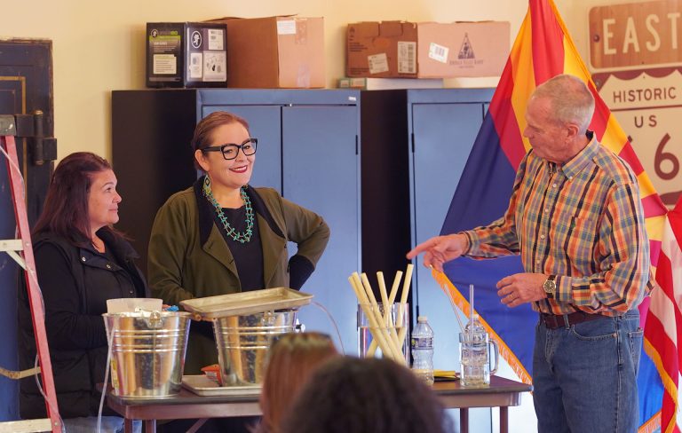 Winslow Councilmember Darcy McKee (left) and Mayor Birdie Cano (center) help Blake Miller (right) in his demonstration during last week’s Good Morning Winslow meeting.