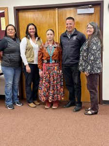 Aiyanna Yazzie (middle) recently achieved a superior score, the highest score, on the Navajo Language Proficiency exam. She was recently celebrated by (left to right) Navajo language teacher Stephanie Nelson, Vice Principal Kourtney Hendricks, Winslow High School Principal Sal Hernandez and Superintendent Connie Gover at the latest school board meeting.