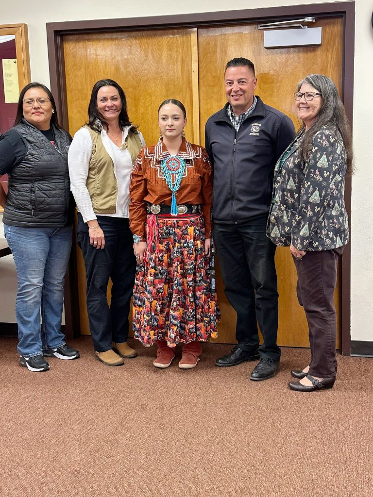 Aiyanna Yazzie (middle) recently achieved a superior score, the highest score, on the Navajo Language Proficiency exam. She was recently celebrated by (left to right) Navajo language teacher Stephanie Nelson, Vice Principal Kourtney Hendricks, Winslow High School Principal Sal Hernandez and Superintendent Connie Gover at the latest school board meeting.