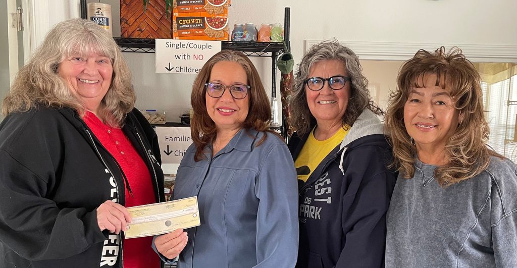 Cindy Allen (left) with the Holbrook Elks Lodge, presented Catholic Charities Director Nancy Barela (second from the left) with a $4,000 check to support the services provided by the organization to those in need, including food, clothing and regular meals. Also pictured from the Holbrook Elks Lodge are Darlene Brinkerhoff (second from left) and Rosalie Harrelson (left). The funds were made available thanks to funding from donations by local Elks Lodge members throughout the year in a grant provided from Elks National Foundation. Worthy organizations are all non-profit and provide much needed services to the community.