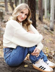 Adysen Leonard, a Winslow High School senior celebrated for her warmth, dedication, and vibrant spirit, pictured in her senior photo.