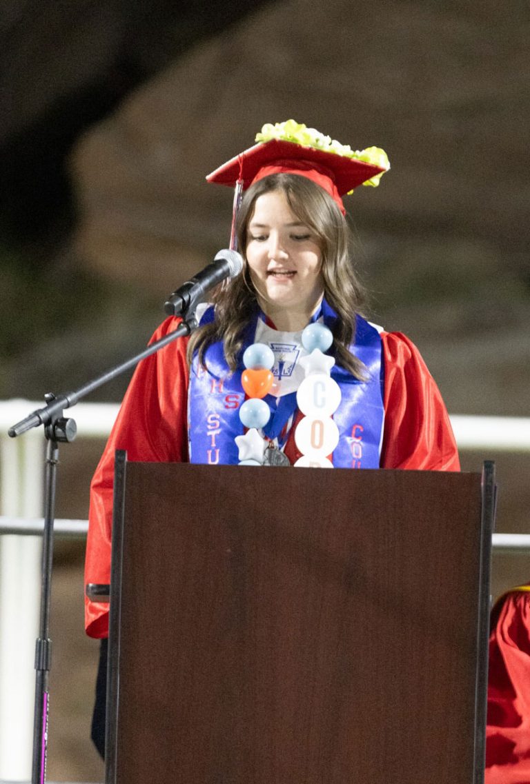 Holbrook High School Salutatorian Socorro Pacheco addresses classmates and those in attendance at the graduation ceremonies held at Roadrunner Stadium.