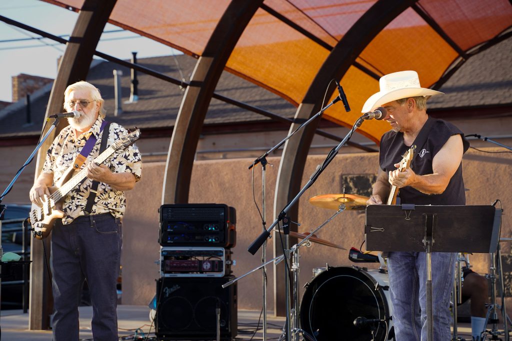 Local musicians Steve Lowry (left) and Tim Kelley (right) of High Lonesome perform at the Winslow Route 66 Plaza on 2nd Street during last week’s June Jams concert, entertaining the crowd with country and rock favorites. The final June’s Jams will be held from 6 to 10 p.m. on Friday with a performance by Bordertown.