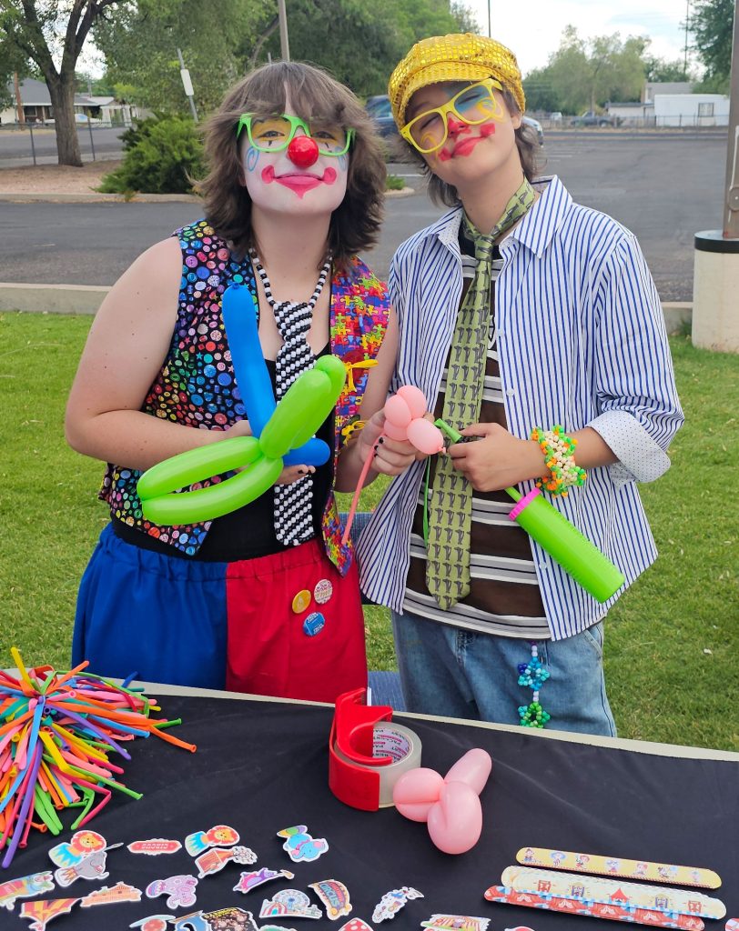A talented group of kids were the feature of a youth market in Joseph City last week. The event featured table upon table displaying baked goods, homemade ice cream, toys, collectables, jewelry, crafts, tie-dyed T-shirts and more. Also featured, were this talented duo, Kiarra Carroll (left) and Rozie Campbell (right) who provide entertainment at parties and created balloon animals at the market for those attending. This event was sponsored by Grow Arizona Workforce Network to provide opportunities for young entrepreneurs throughout Navajo County.