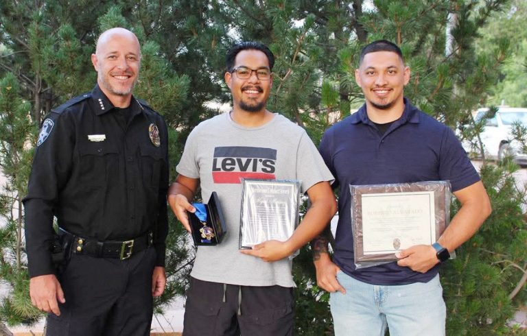 Snowflake-Taylor Police Chief Bobby Martin (left) presented citizen Miguel Martinez (center) with the Meritorious Conduct Award for his courageous and selfless actions on May 21, when he stepped in to assist STPD Officer Robeto Alvarado (right) in bringing a dangerous situation under control. Officer Alvarado received the Chief’s Commendation for his exceptional professionalism and unwavering composure in the same incident. Alvarado was transporting a suspect when he escaped his handcuffs and climbed into the front of the vehicle cab and struggled with the officer. Alvarado was able to safely stop the vehicle and Martinez, who was traveling along the same road assisted Alvarado in safely restraining the suspect without incident.