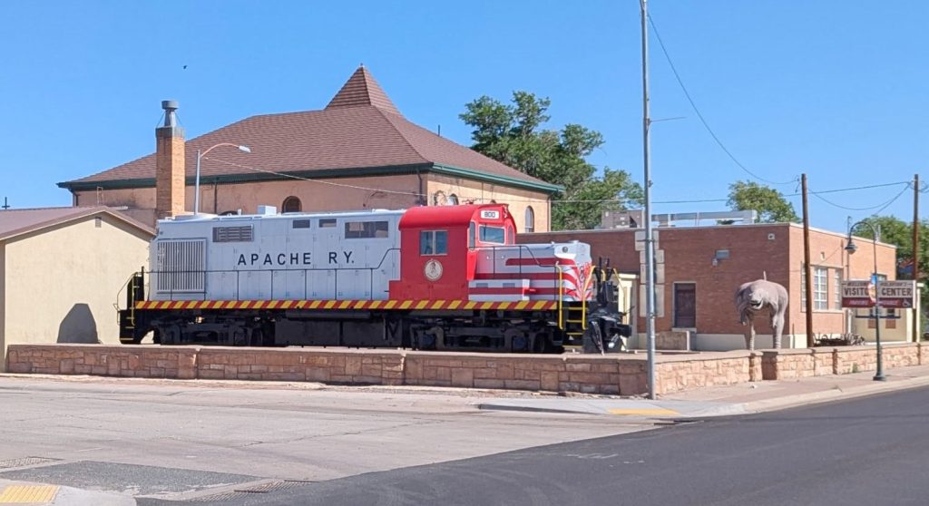 The restored ALCO ADA 800 locomotive is now permanently displayed outside the historic courthouse in Holbrook. The train, which once carried lumber and wind turbine blades across northeastern Arizona, was refurbished through community efforts and unveiled last week. Moving the train to its current location was no small task due to its weight.