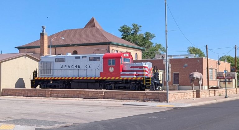The restored ALCO ADA 800 locomotive is now permanently displayed outside the historic courthouse in Holbrook. The train, which once carried lumber and wind turbine blades across northeastern Arizona, was refurbished through community efforts and unveiled last week. Moving the train to its current location was no small task due to its weight.