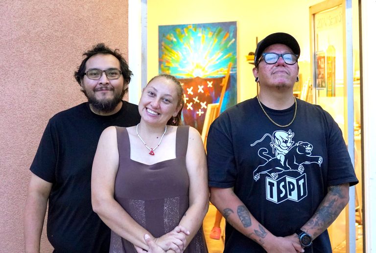 At the grand opening of Broken Focus Studio on Aug. 23 in Winslow, artists Randall Sahmie (left), Cheri Sahmie (center) and Yancey Katoney (right) welcomed the community into their new shared creative space.