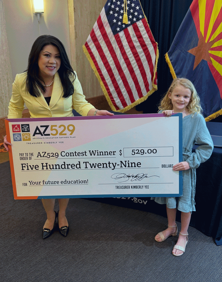 Arizona State Treasurer Kimberly Yee Addison Richards (left) is pictured with Arizona State Treasurer Kimberly Yee as she receives her check as one of 19 youth selected in the AZ529 Art Contest. Her artwork (also pictured) is a depiction of what she hopes to become once she’s grown up.