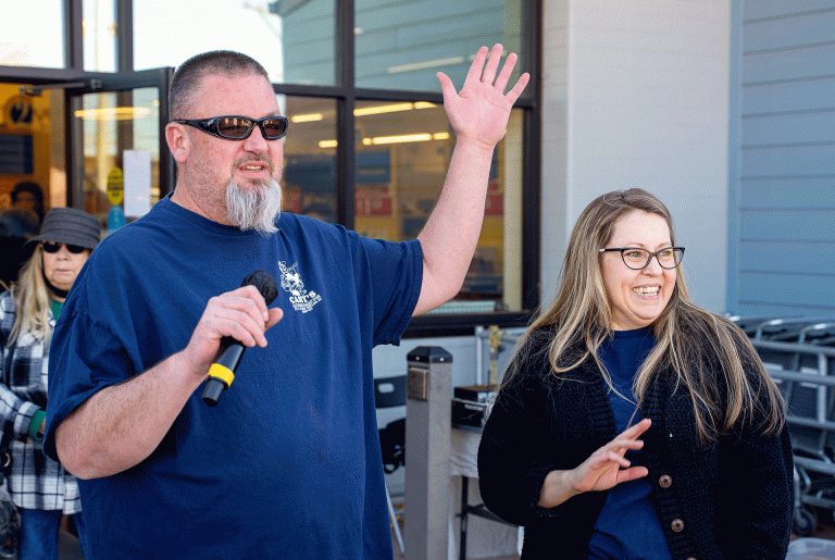 Kyle and Jody Johnson stand outside Casey’s Color Center during the store’s recent ribbon cutting ceremony. The couple took ownership on Jan. 1, and have spent the past several months restocking shelves and restoring the longtime Winslow business.