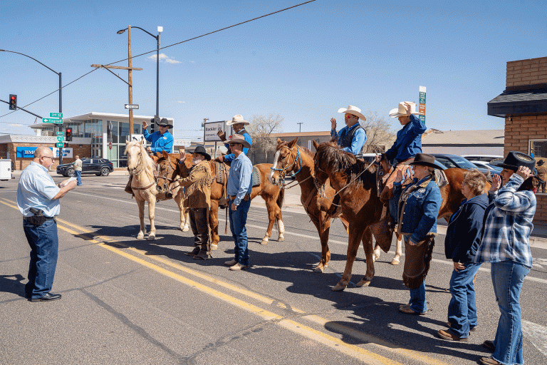 The Clear Creek Cowboys, seen here being sworn by Chief of Police Ernie Cano in front of the Winslow Post Office, completed their annual ride from Holbrook to Winslow again this year on March 7. The Cowboys visited the elementary schools to answer the kid’s cowboy questions and ended their annual ride at Standin’ on the Corner Plaza where they donated $3,000 to Winslow school district.