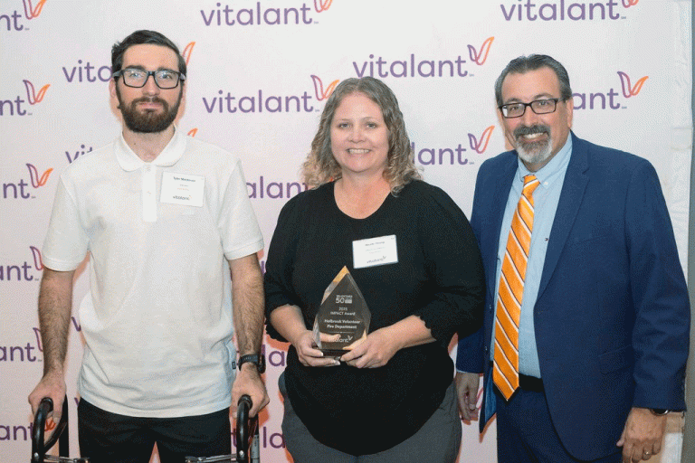 Pictured are (left to right) blood recipient Phoenix Police Officer Tyler Moldovan, Nicole Young with Holbrook Volunteer Fire Department and Vitalant Division Vice President Sid Lewis.