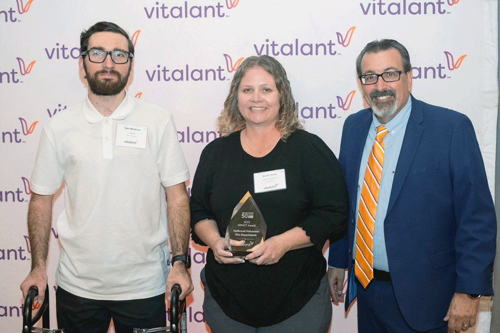 Pictured are (left to right) blood recipient Phoenix Police Officer Tyler Moldovan, Nicole Young with Holbrook Volunteer Fire Department and Vitalant Division Vice President Sid Lewis.