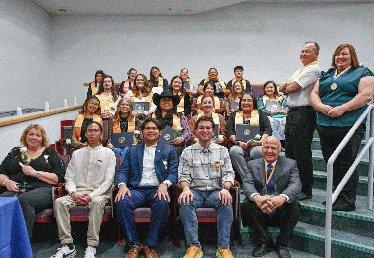 Pictured are PTK inductees (back row, left to right) Shania Polelonema, Thea Sellers, Jessica Smith, Danielle Teague, Christina Yazzie, Salvador Kreuger, (third row) Dylan Hatch, Celia Iguado, Joyce Lander, Uyen Le, Loa Ludwig, Paula Andrea Pinete Reynaud, (second row) Tyree Alchesay, Isabella Buchholz, Celeste Cardy, Alexis Casillas, Venessa Franklin, PTK Faculty Advisor James Gil, PTK Advisor Shawntel Skousen, (front row) PTK Vice President of Fellowship Jana-Ray Nielipinski, PTK Vice President of Public Relations Seth Marticion, PTK Vice President of Leadership Rafael Salazar, PTK President Daniel Webb and PTK Advisor Dana Copland.