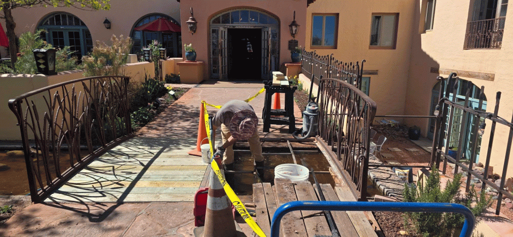 With exceptionally warm temperatures, the staff at La Posada Hotel in Winslow has gone into spring project mode including replacing the wood slats in the beautiful entry bridge made by local artist John Suttman several years ago. In addition to its beautiful grounds and rooms, the hotel includes the Turquoise Room and gift shop.