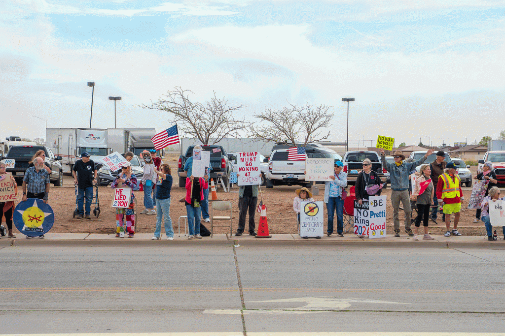 On March 28, more than 50 demonstrators crowded the intersection of North Park Drive and Desmond Street in Winslow during a “No Kings” march, peacefully protesting the policies and actions of President Donald Trump. Protests were held throughout the world as part of the event.