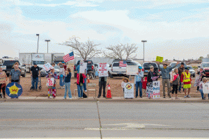 On March 28, more than 50 demonstrators crowded the intersection of North Park Drive and Desmond Street in Winslow during a “No Kings” march, peacefully protesting the policies and actions of President Donald Trump. Protests were held throughout the world as part of the event.