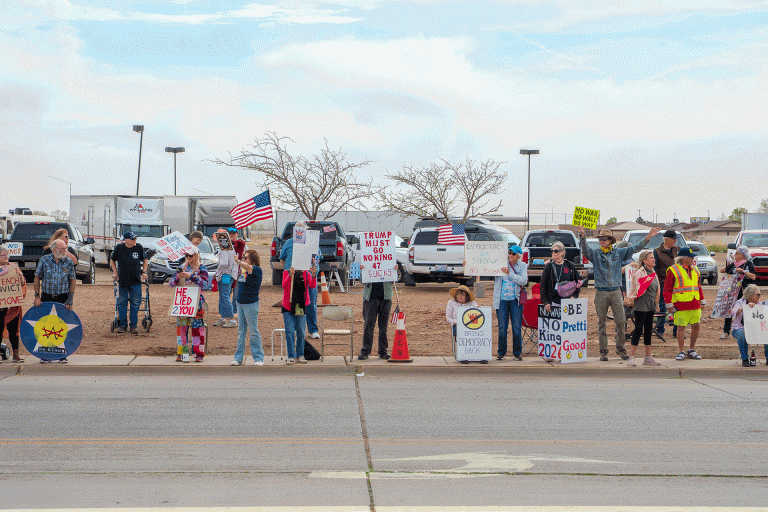 On March 28, more than 50 demonstrators crowded the intersection of North Park Drive and Desmond Street in Winslow during a “No Kings” march, peacefully protesting the policies and actions of President Donald Trump. Protests were held throughout the world as part of the event.