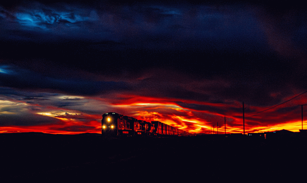 An eastbound BNSF train races by the Jack Rabbit Trading Post in Joseph City under a fiery sunset on March 22, a perfect example of the beautiful sunsets of northern Arizona.